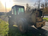Minituur van 2000 Caterpillar TH63 verreiker