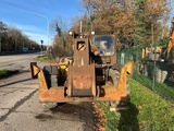 Minituur van 2000 Caterpillar TH63 verreiker