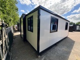 Minituur van 2025 Rhino-Houses 36,5 m2 2 slaapkamers, badkamer en keuken Mobiele woonunit / Tiny house