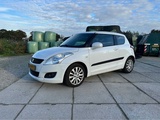 Minituur van 2011 Suzuki Swift Personenauto