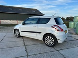 Minituur van 2011 Suzuki Swift Personenauto